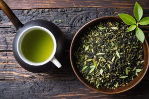 asian-tea-ceremony-grunge-teapot-with-dry-leaf-bowl-black-background asian-tea-ceremony-grunge-teapot-with-dry-leaf-bowl-black-background