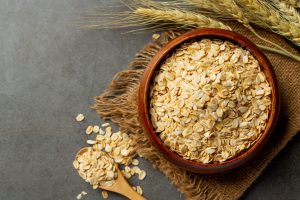 raw barley grain in old dark background raw barley grain in old dark background